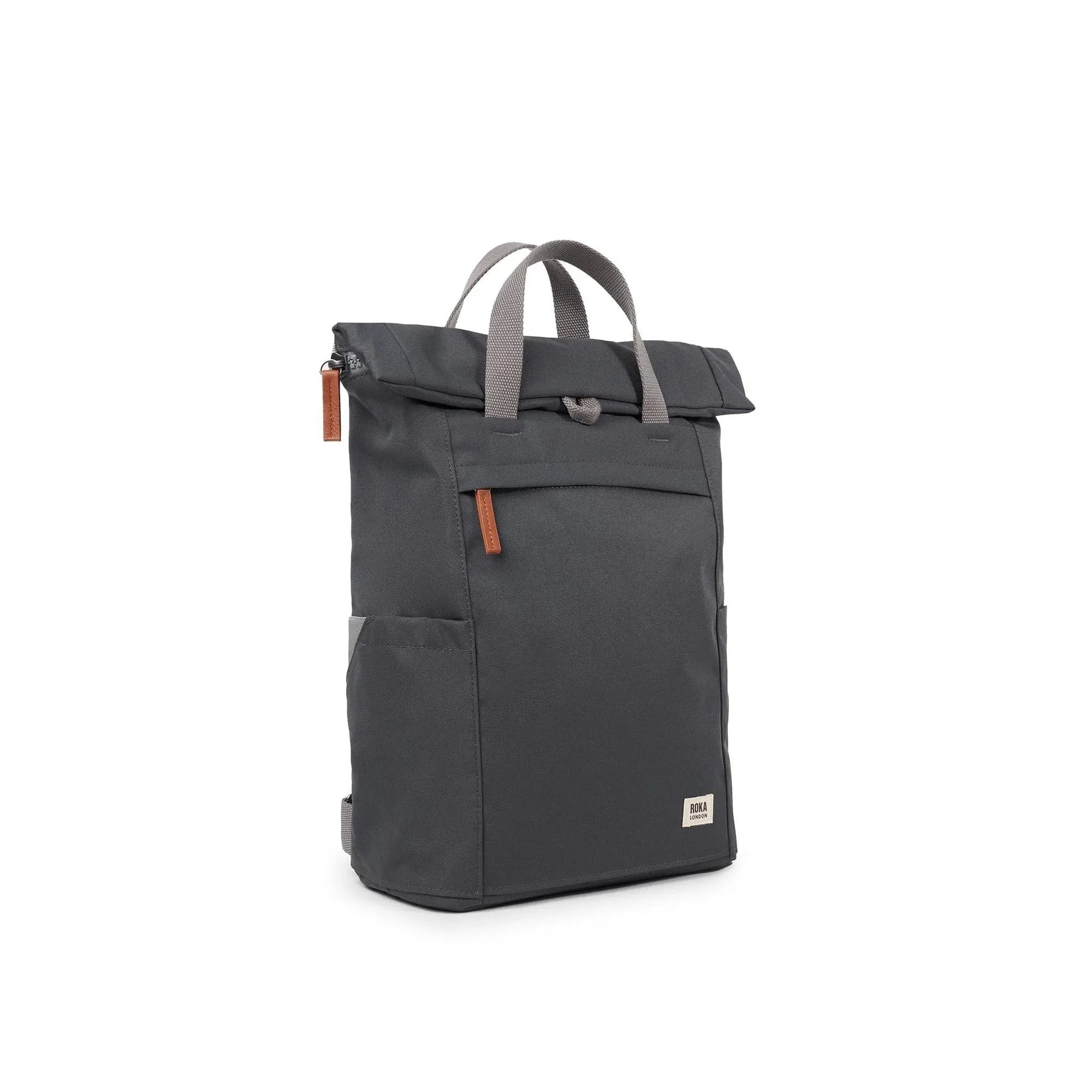 Roka Finchley A Faded Black Recycled Canvas backpack with padded shoulder straps and front zip pocket.