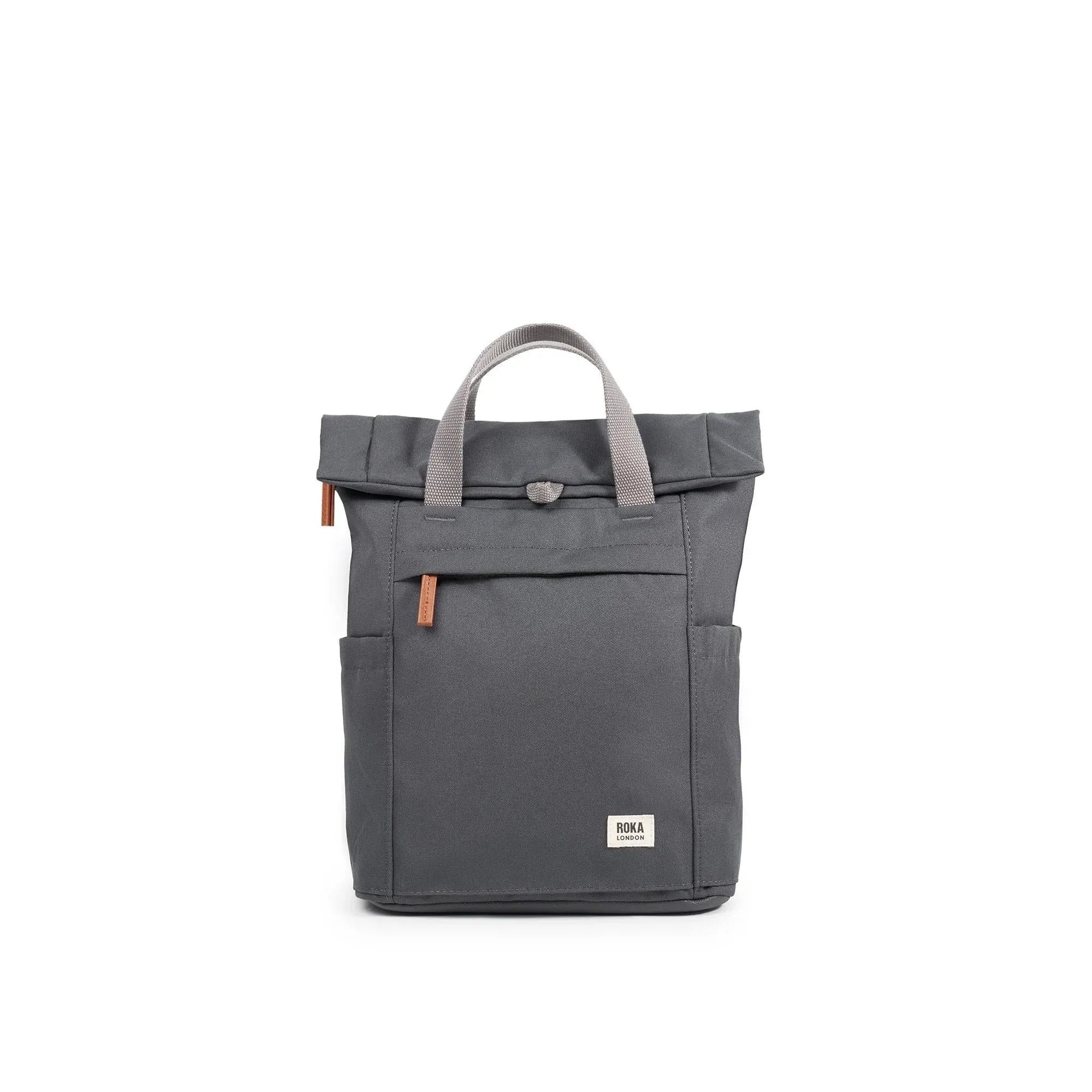Roka Finchley A Faded Black Recycled Canvas backpack with beige handles and front pocket.