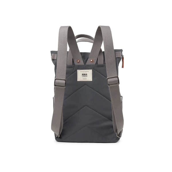 Roka Finchley backpack in faded black recycled canvas with adjustable straps and front label detail.