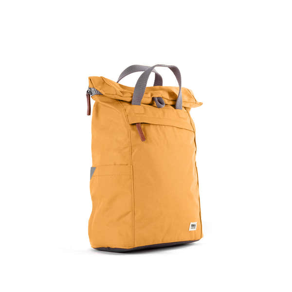 Roka Finchley A Flax recycled canvas backpack in mustard yellow with gray handles and accents, outdoor, eco-friendly design.
