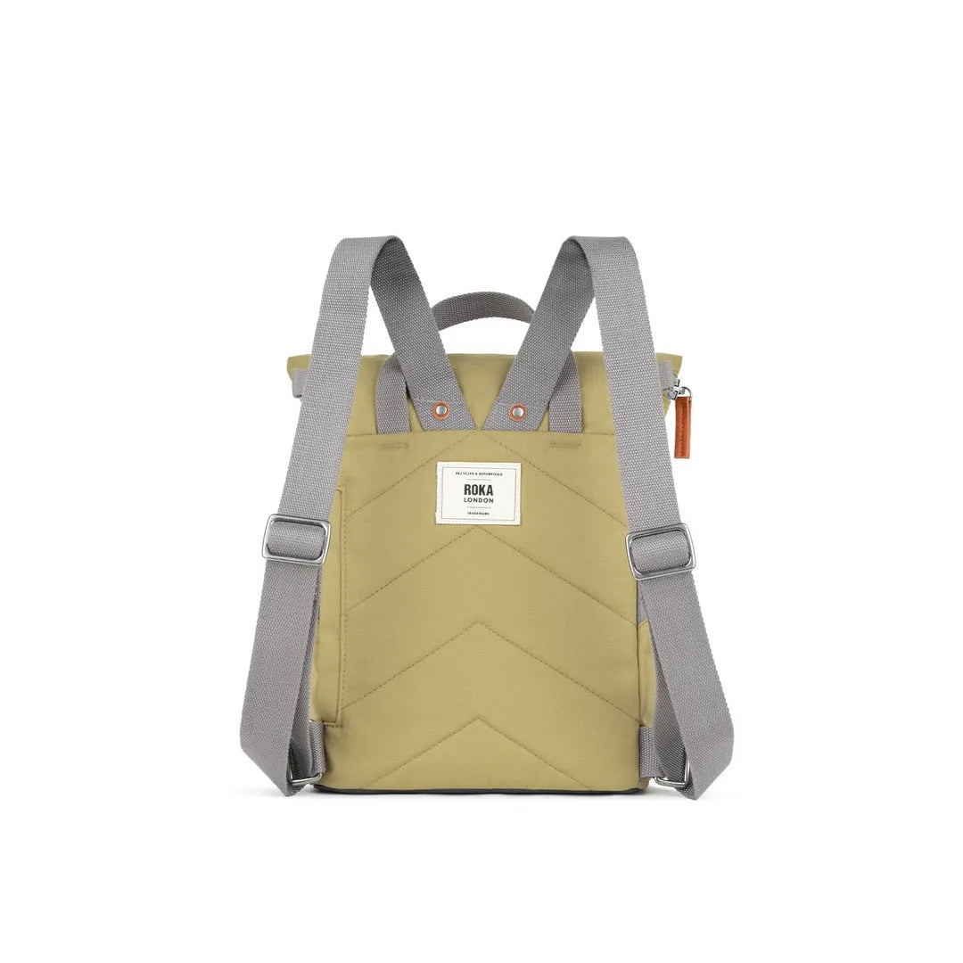Roka Finchley A Khaki Recycled Canvas backpack with gray adjustable straps and front label, eco-friendly design.