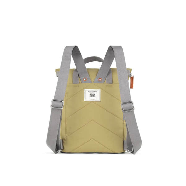 Roka Finchley A Khaki Recycled Canvas backpack with gray adjustable straps and front label, eco-friendly design.