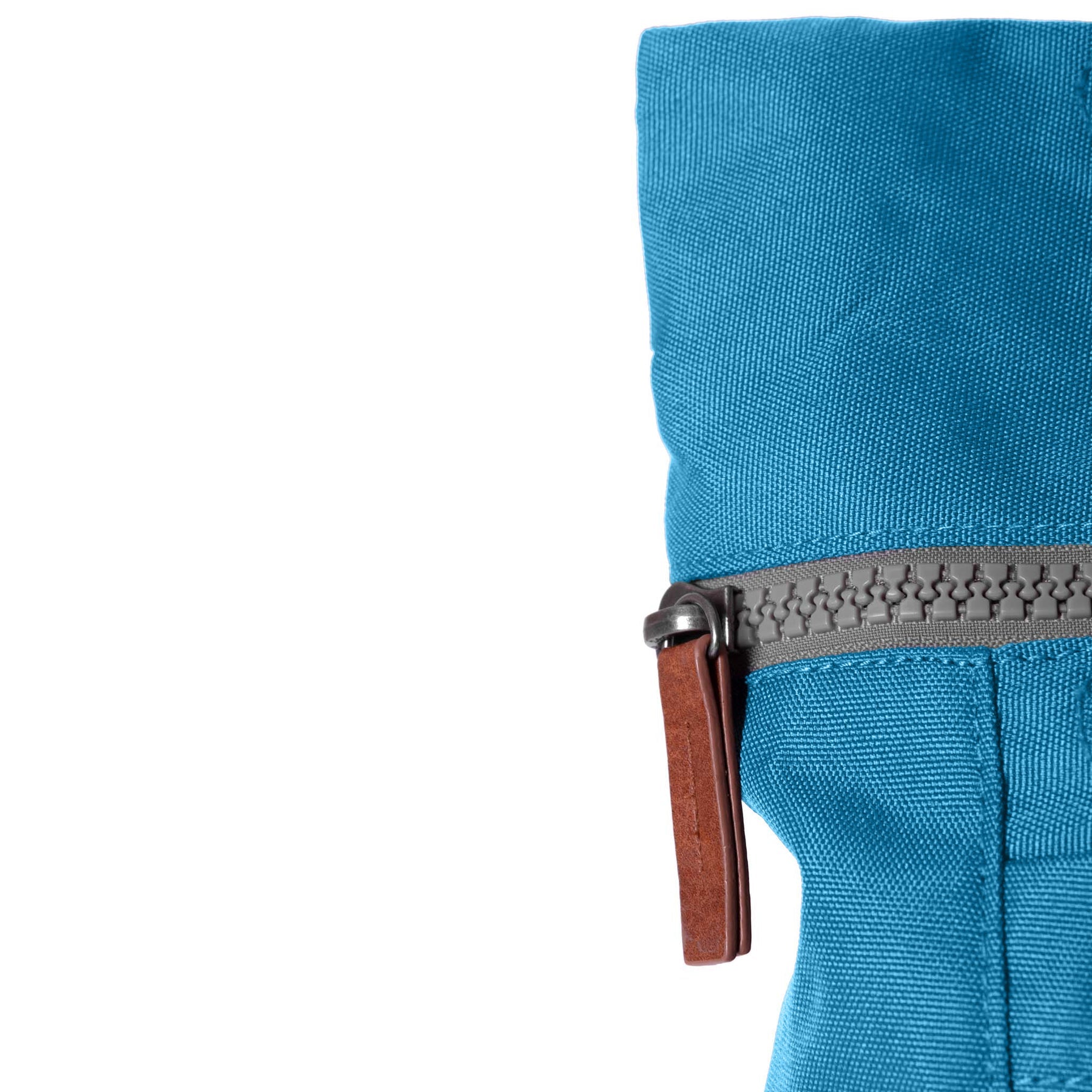 Roka Finchley A Marine recycled canvas backpack with blue fabric and gray zipper.