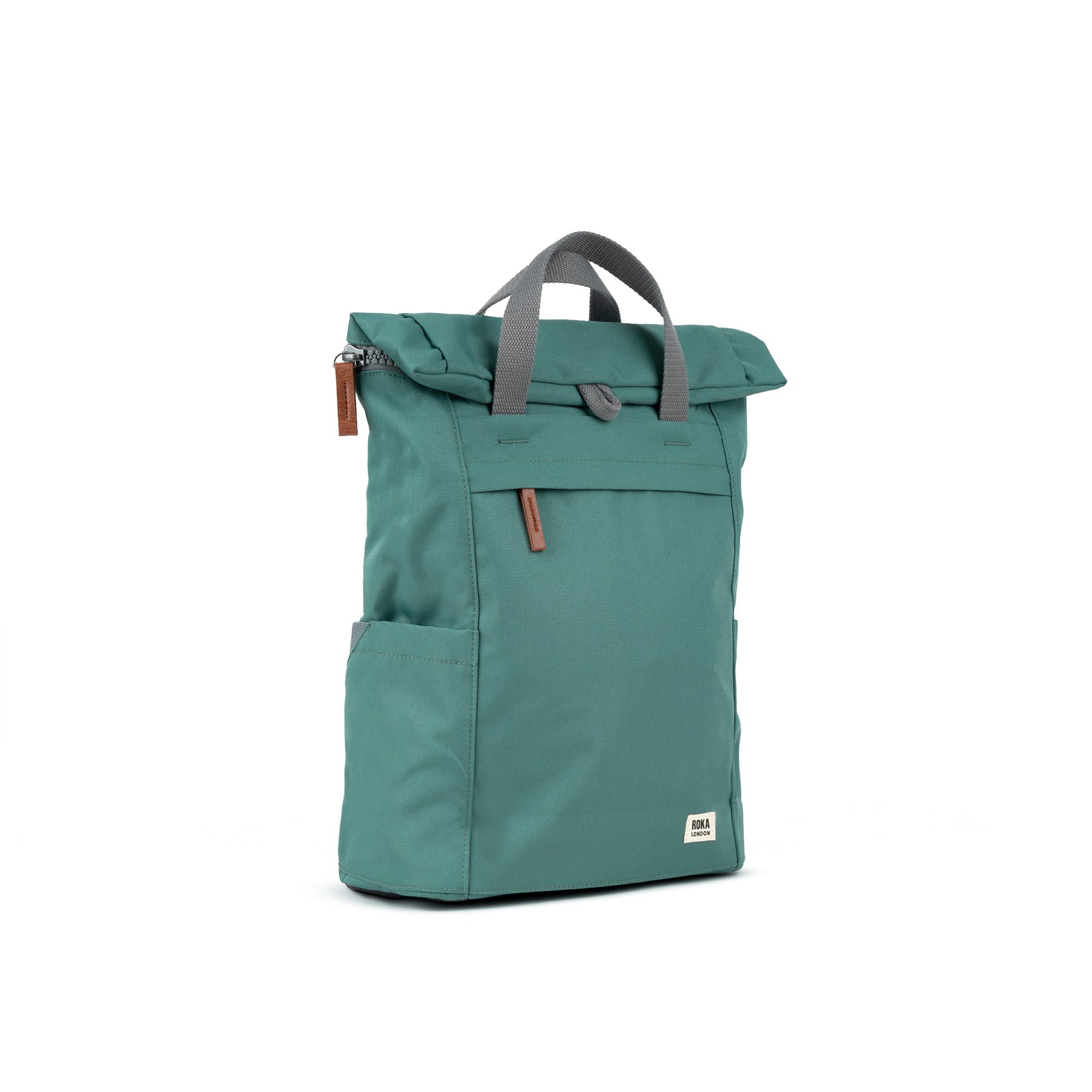 Roka Finchley A Sage Recycled Canvas backpack, fold-over top, front zip pocket, side pocket, gray handles, white logo tag.