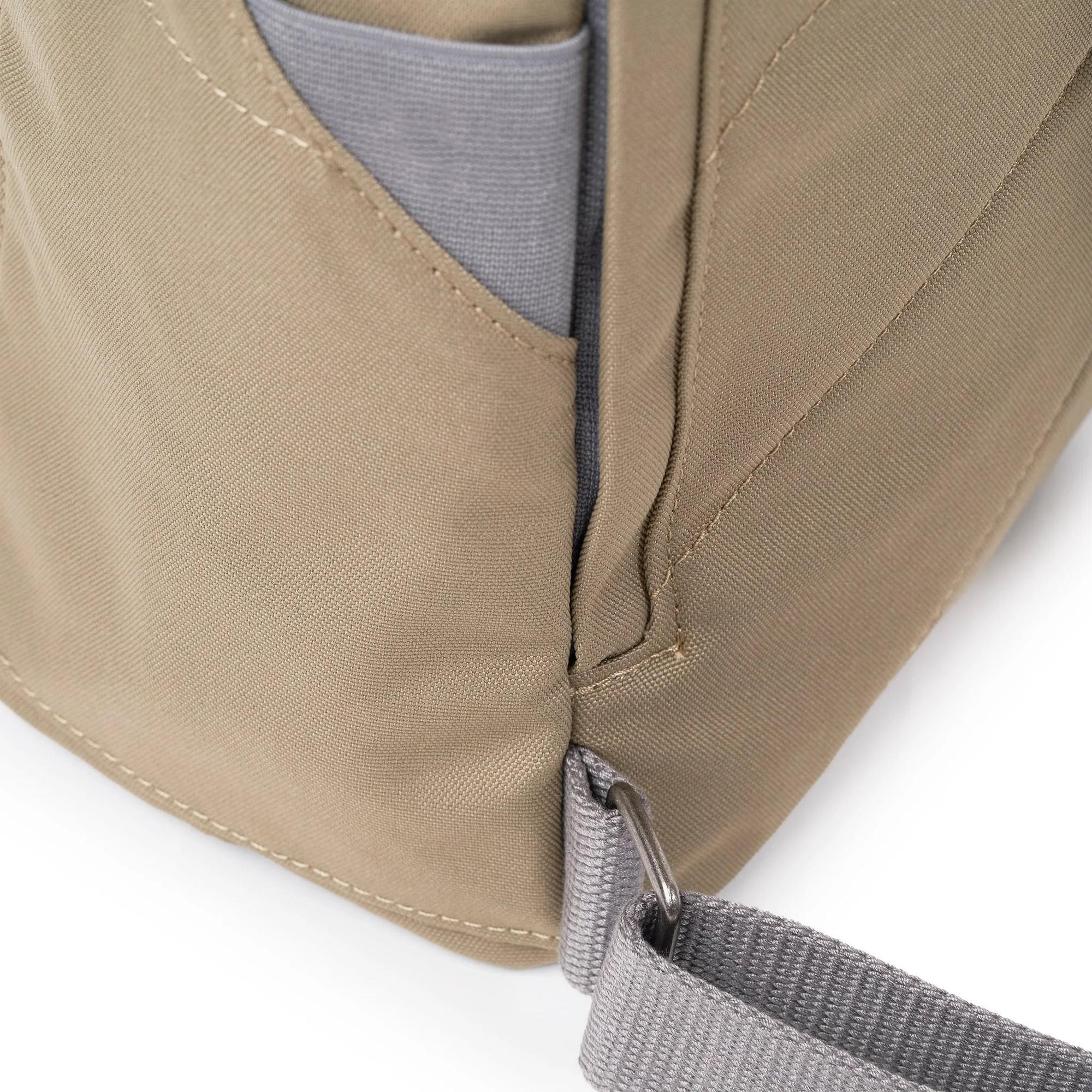 Roka Finchley tote bag in taupe recycled canvas with gray accents and adjustable strap, durable eco-friendly material.