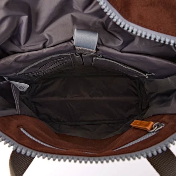 Roka Finchley Medium Chocolate Recycled Canvas Backpack, side view.