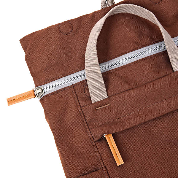Roka Finchley Small Chocolate Recycled Canvas Backpack, zip detail.