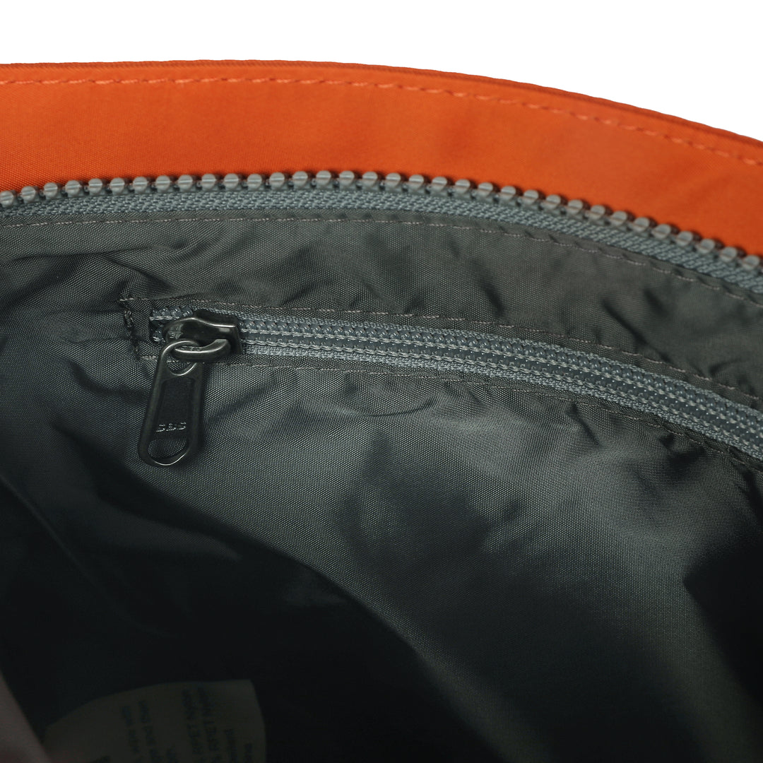Roka Kennington B Crossbody Recycled Nylon Burnt Orange-elevate your sole