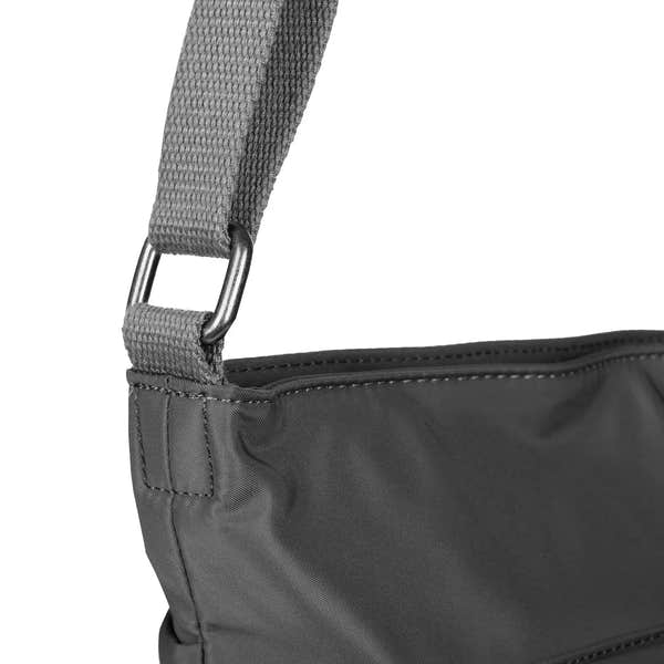 Roka Kennington B crossbody bag made of recycled nylon in graphite, featuring a grey adjustable strap and durable stitching.