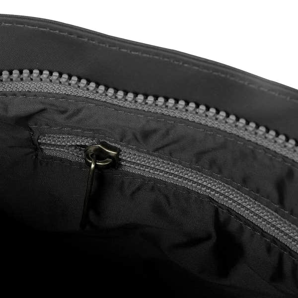 Roka Kennington B Crossbody recycled nylon bag in graphite with zippered interior pocket and durable black material.