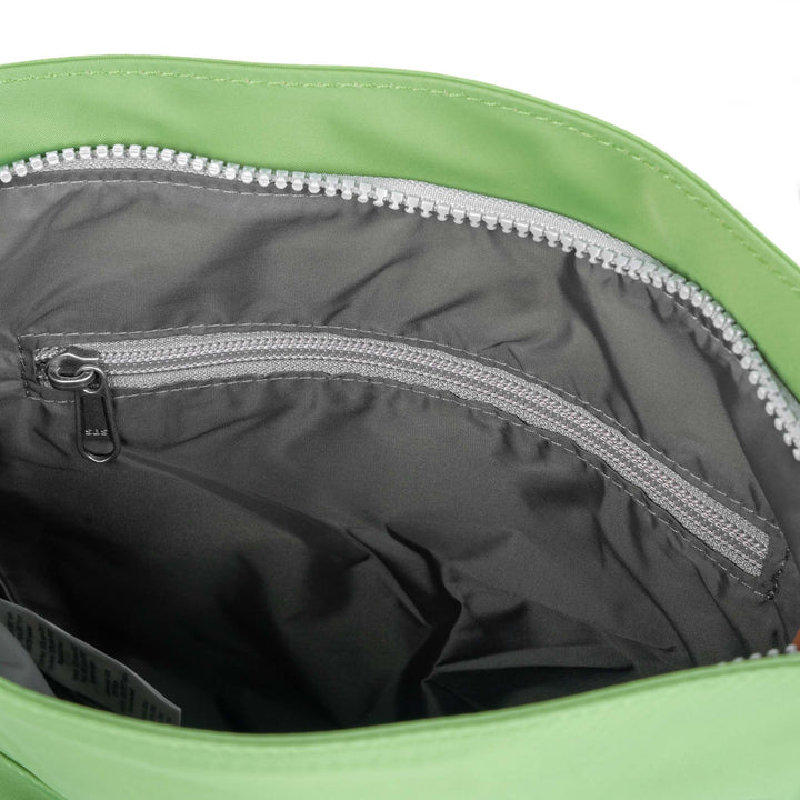 Roka Kennington B Kiwi recycled nylon interior of lime green tote bag with zipper pocket, eco-friendly and stylish design.