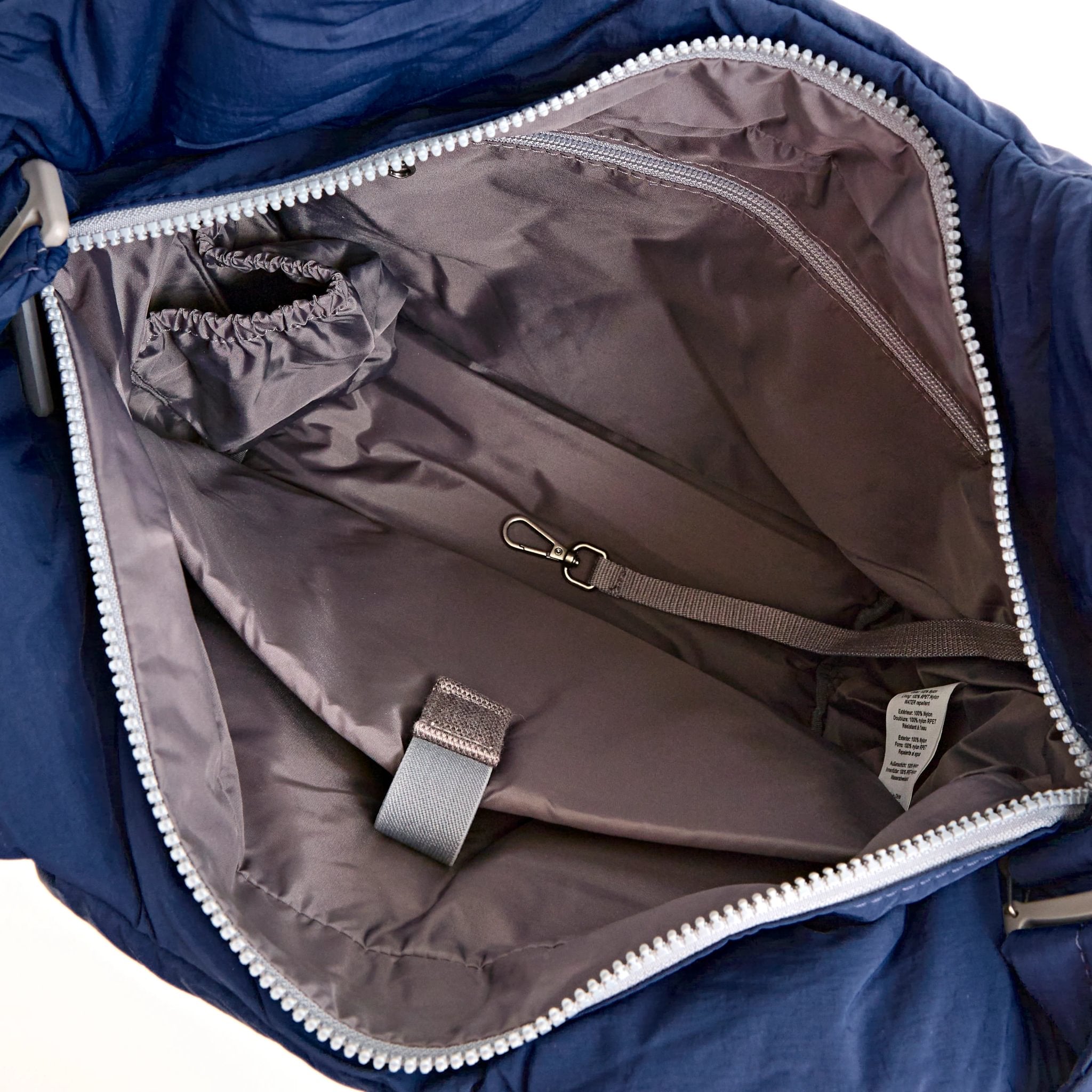 Roka Oxford Deep Cobalt Recycled Taslon Shoulder Bag, side view.