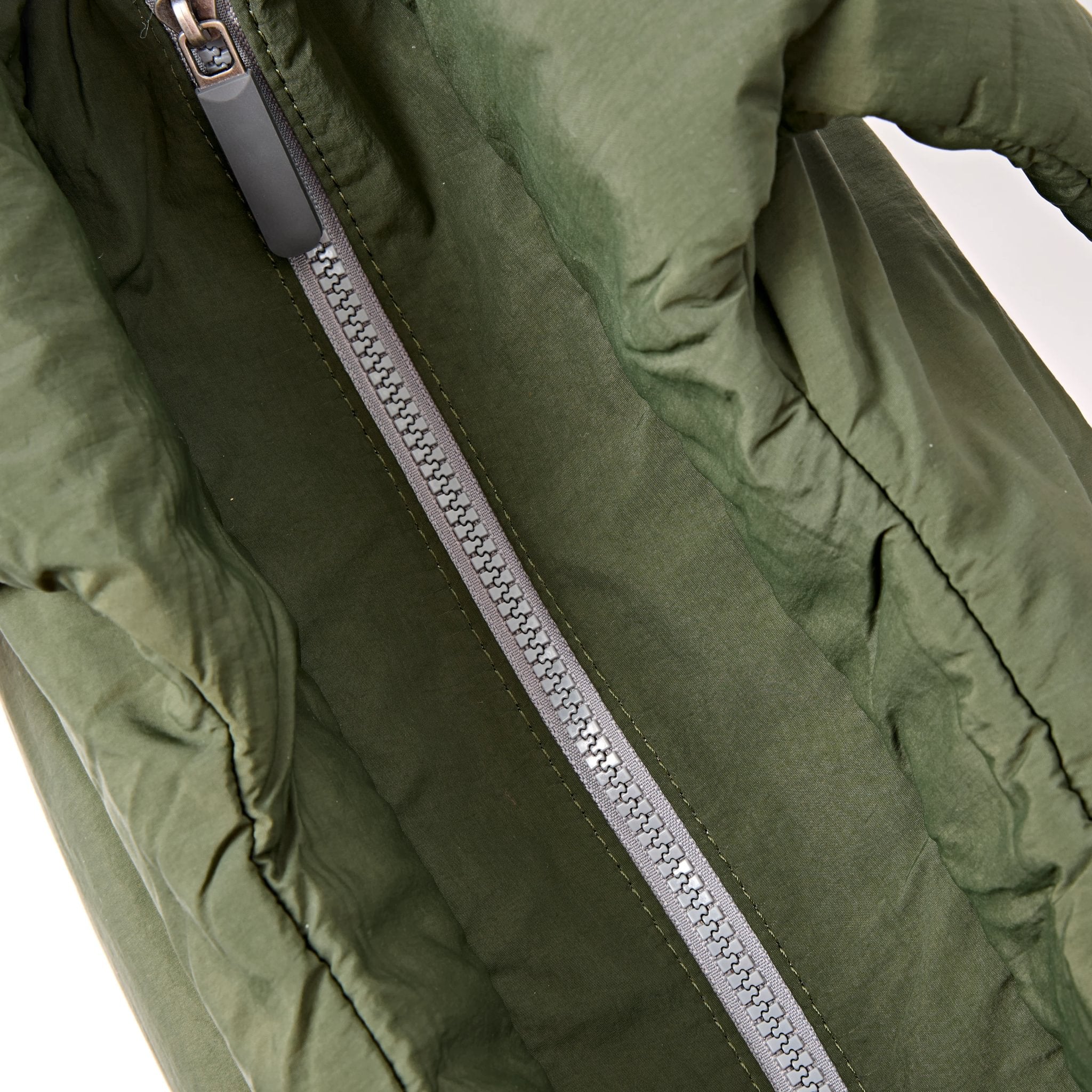 Roka Oxford Olive Recycled Taslon Shoulder Bag, zip detail.