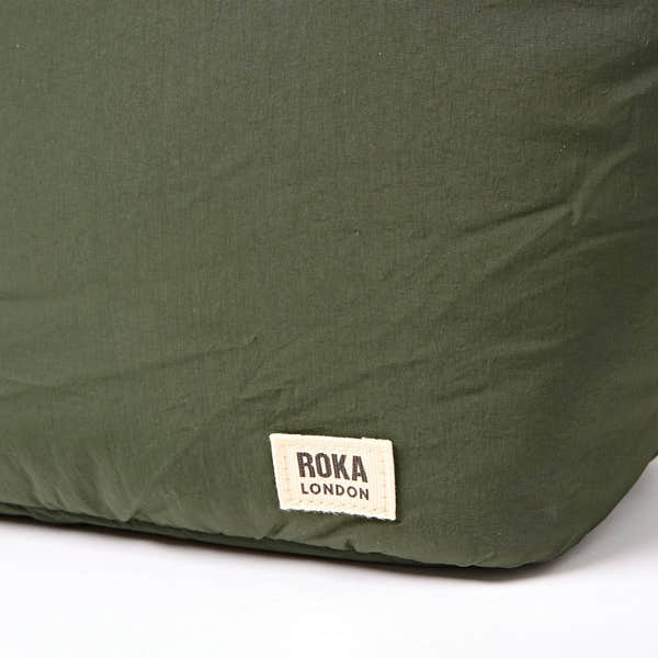 Roka Oxford Olive Recycled Taslon Shoulder Bag, brand label detail.