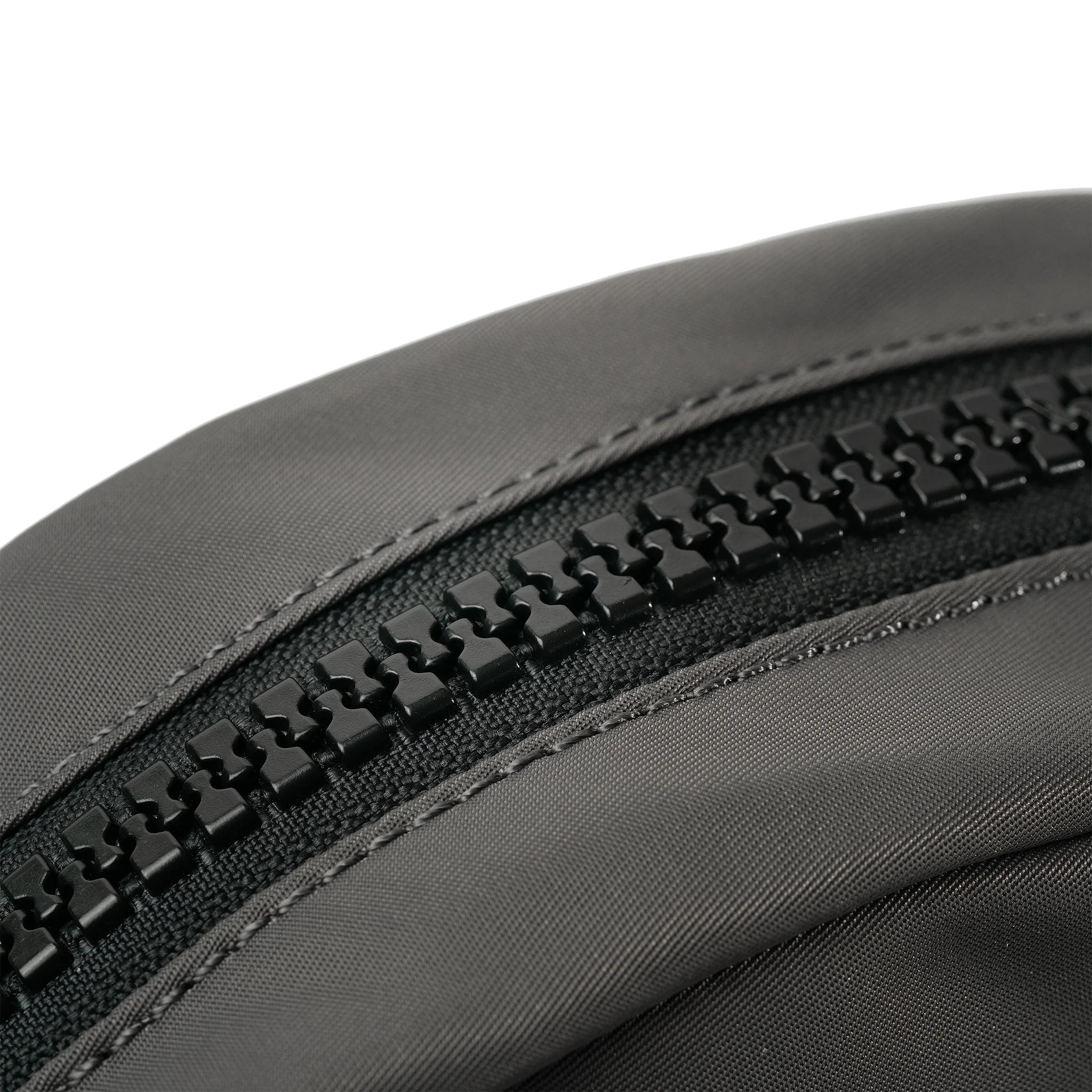 Roka Paddington Graphite Recycled Nylon Crossbody Bag, zip detail.