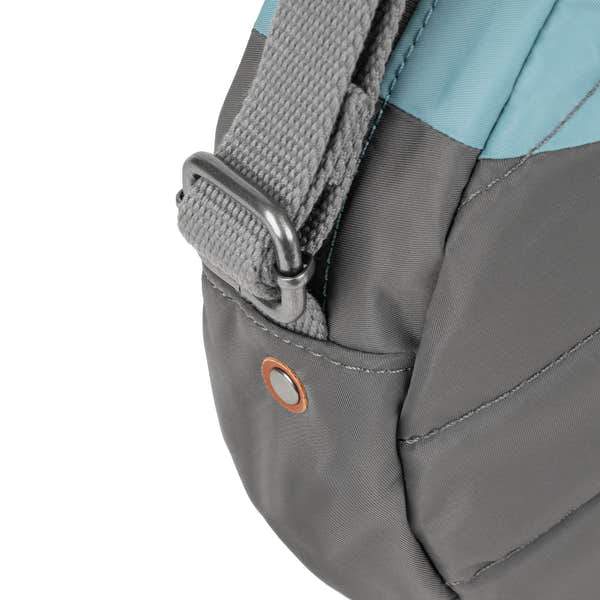 Roka Paddington Graphite Recycled Nylon Crossbody Bag, hardware detail.