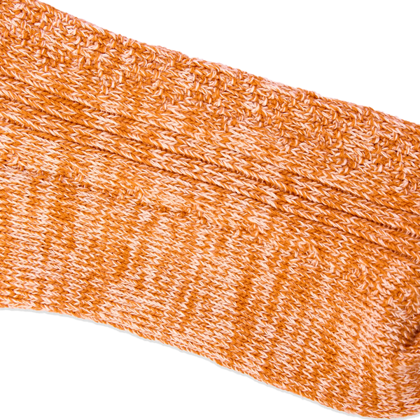 Roka Wallace Crew Socks for Women in Burnt Orange — knit texture close-up.