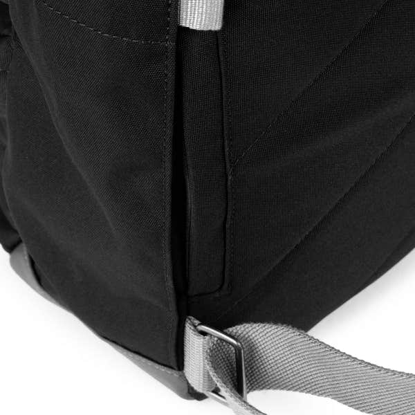 Roka Waterhouse Recycled Canvas Ash backpack with black textured fabric, grey adjustable strap, and sleek design.