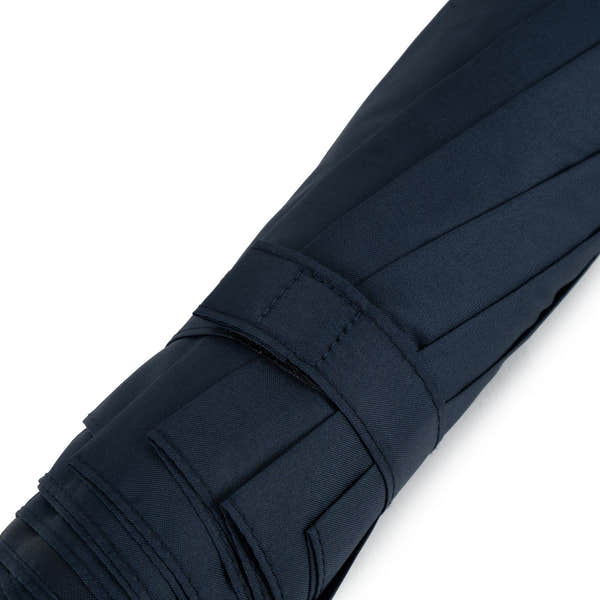 Roka Waterloo Midnight Recycled Nylon bag with sleek navy blue design, multiple compartments, and adjustable strap.