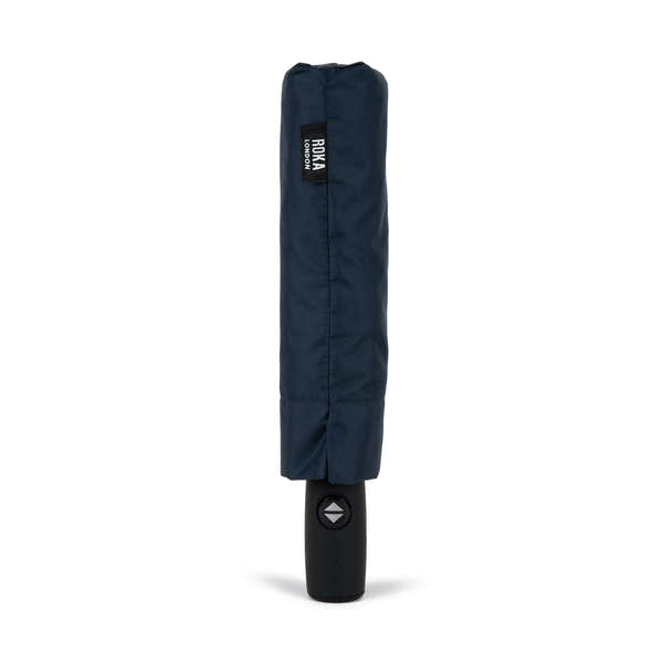 Roka Waterloo Midnight recycled nylon umbrella with black handle and logo label, compact and weather-resistant.