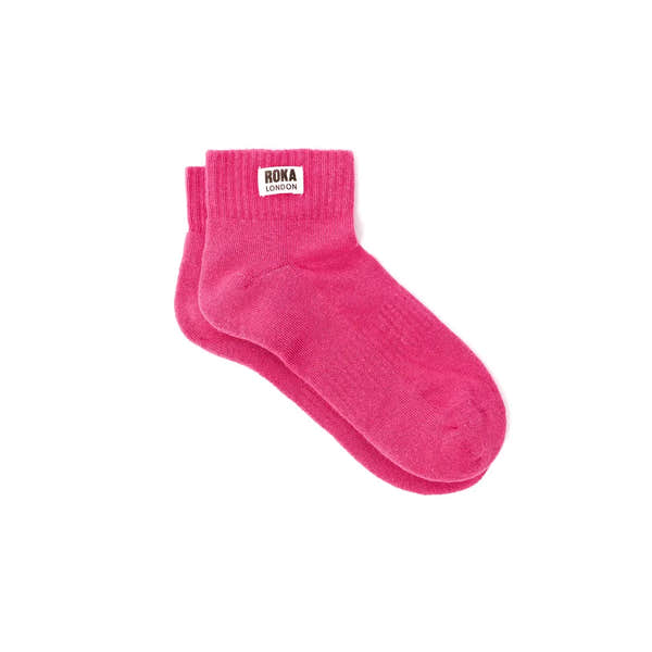 Pink Roka Wembley cotton socks with a white logo patch, breathable and comfortable, suitable for everyday wear.
