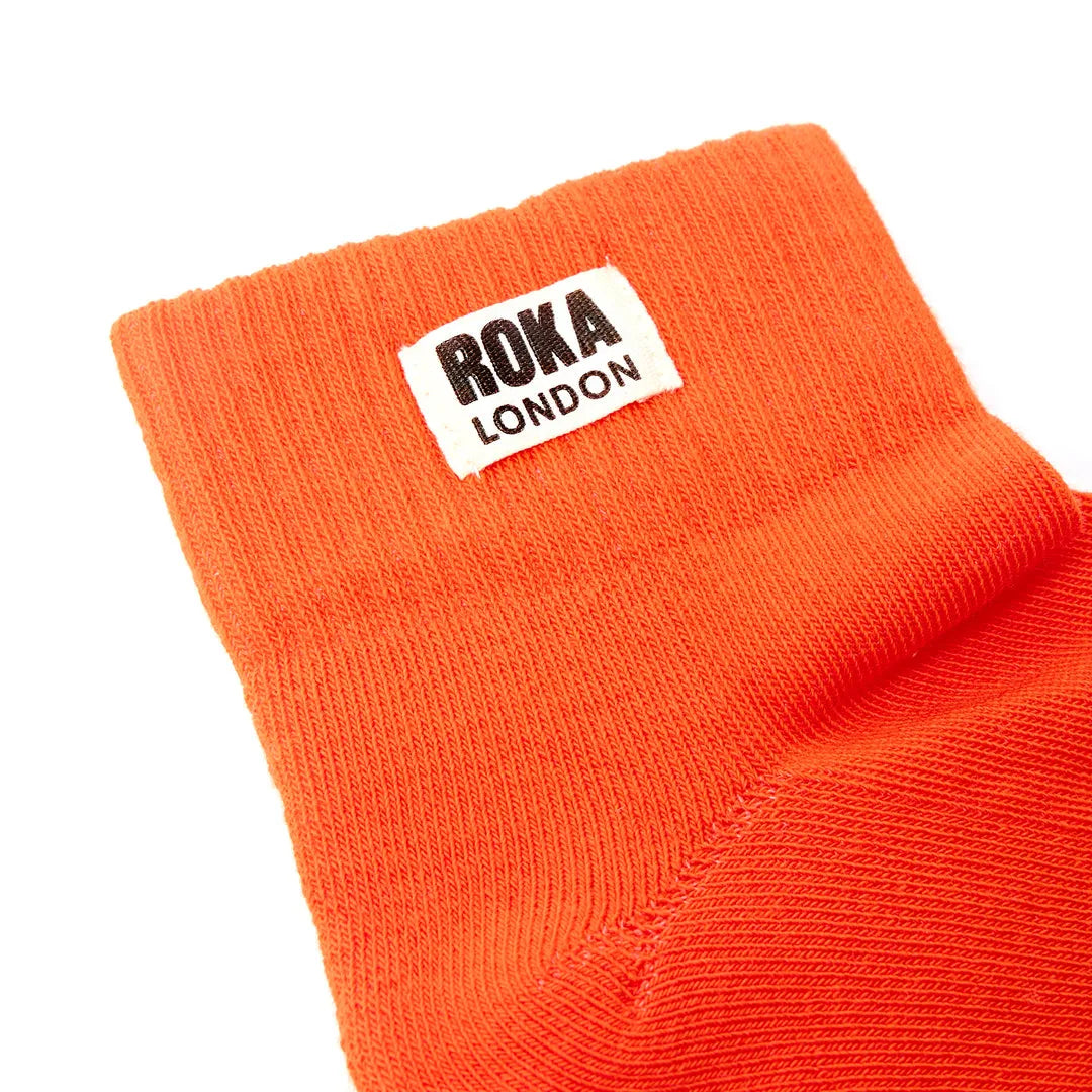 Roka Wembley Cotton Socks in Jaffa Orange color with white branding label, comfortable crew length, casual men's or women's socks.