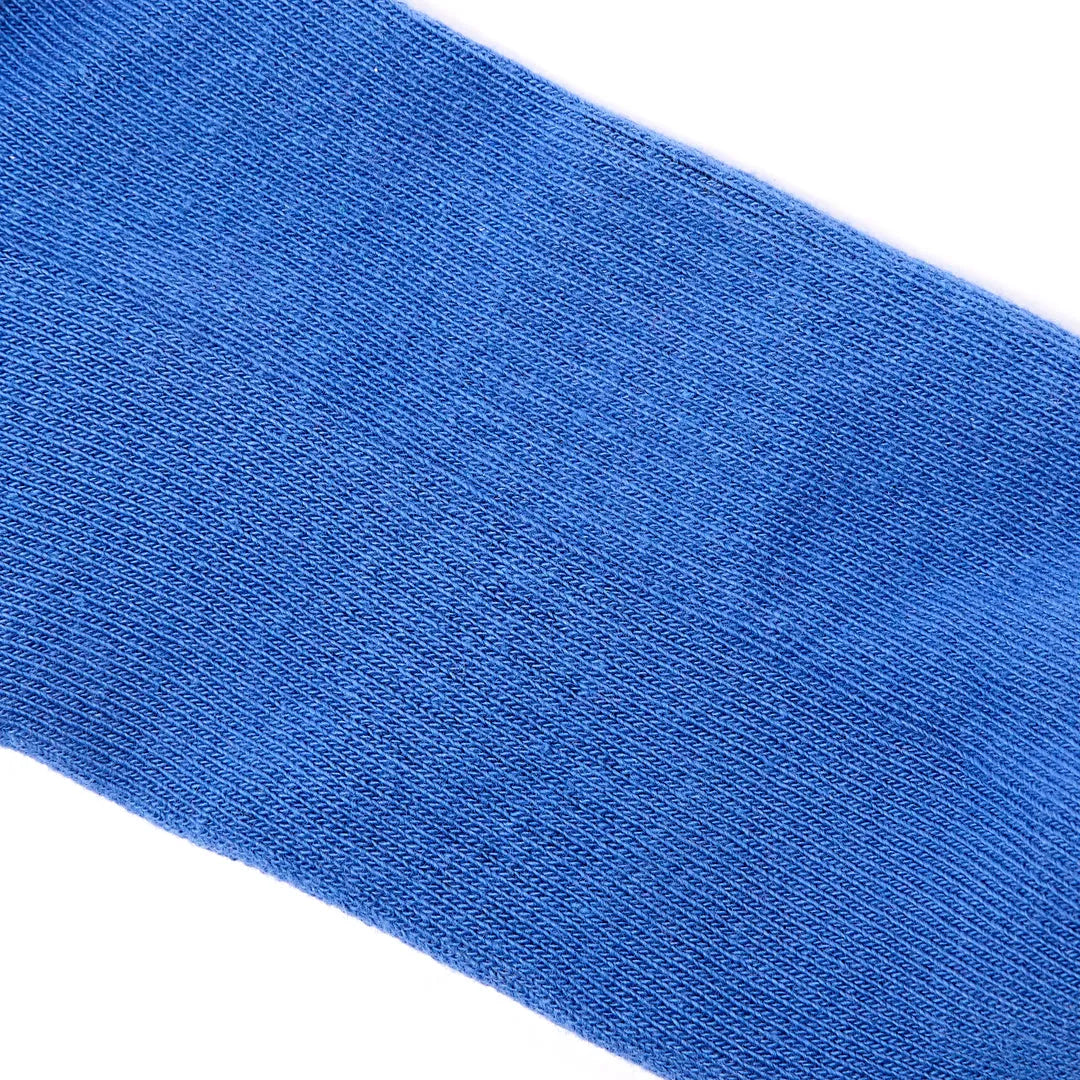 Roka Wembley Cotton Socks in Malibu Blue, close-up of soft, breathable fabric with fine knit texture.