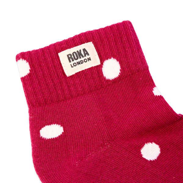 Roka Wembley Ankle Socks for Women in Granita Red Dot — ribbed cuff and logo close-up.