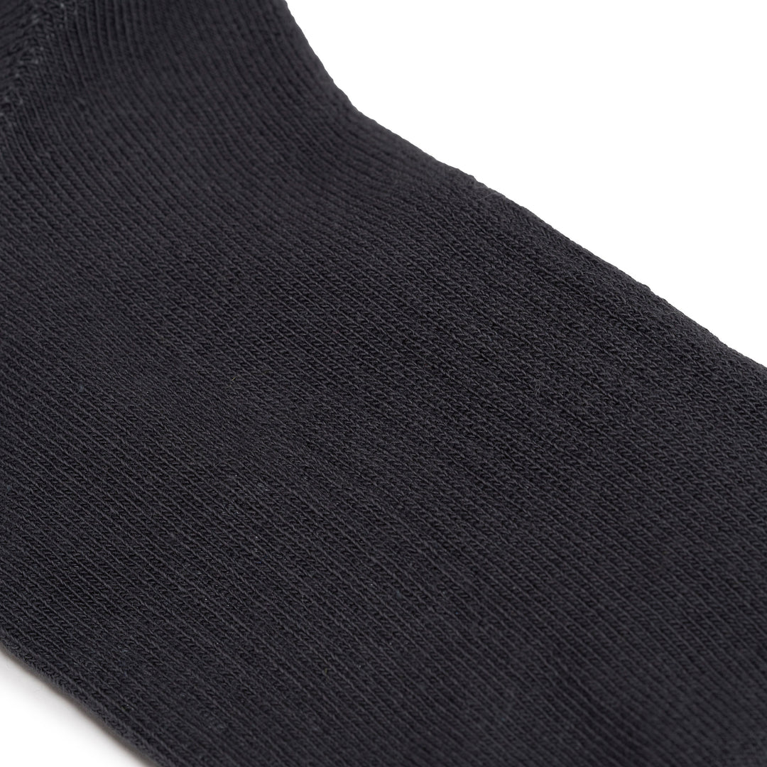 Roka Wembley Men's Faded Black Organic Cotton One Size Sock, close-up of textured fabric.