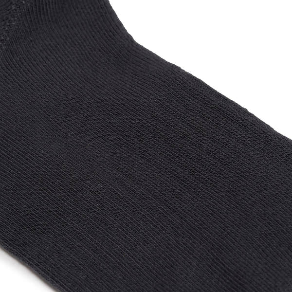 Roka Wembley Men's Faded Black Organic Cotton One Size Sock, close-up of textured fabric.