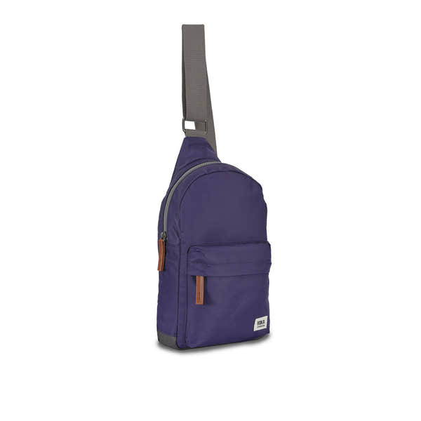 Roka Willesden B Mulberry large recycled nylon sling bag with front pocket, adjustable strap, and tonal zippers.