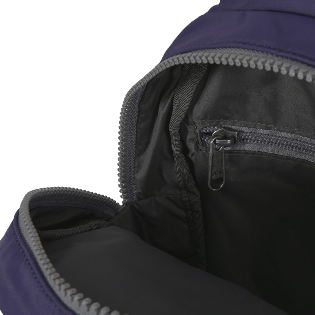 Roka Willesden B Mulberry large recycled nylon backpack with interior zip pocket and spacious main compartment.