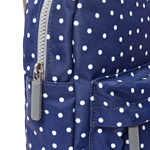 Roka Willesden Navy Polka Dot Recycled Canvas Sling Bag, zip detail.