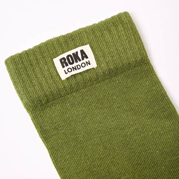 Roka Wimbledon Ladies Cotton Crew Sock in olive green with a white label, one size, avocado color, comfortable and casual footwear accessory.