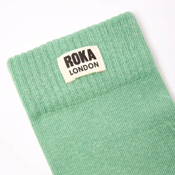 Roka Wimbledon Ladies Cotton Crew Sock in Matcha green, one size, featuring a woven Roka London logo patch.