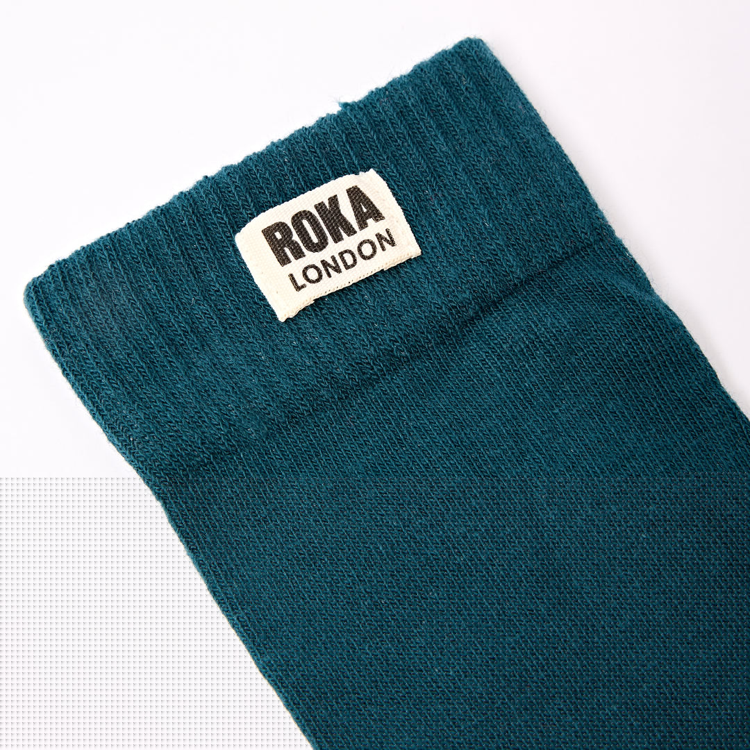 Roka Wimbledon Ladies Cotton Crew Sock in teal, one size, featuring a knit texture and ROKA LONDON label.
