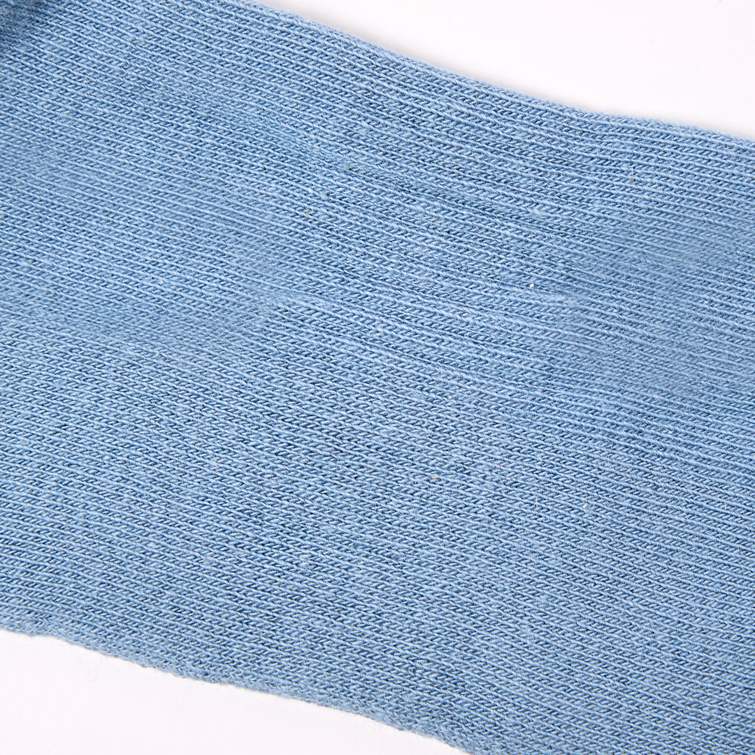 Roka Wimbledon men's cotton crew sock in light blue with Airforce branding, one size, breathable and comfortable design.