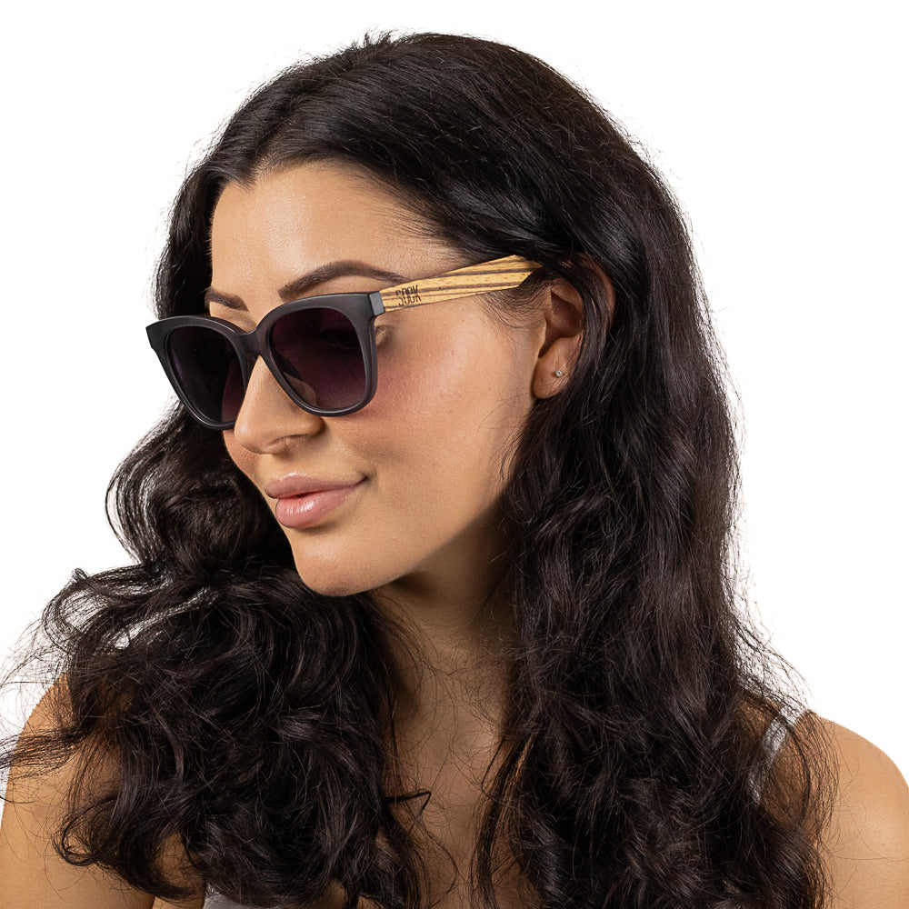 SOEK Lila Grace sunglasses with charcoal grey gradient lenses, black frames, and walnut wood arms, stylish and UV protective.