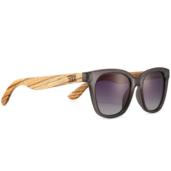 SOEK Lila Grace sunglasses with charcoal grey frame, gradient lenses, and walnut wood arms.