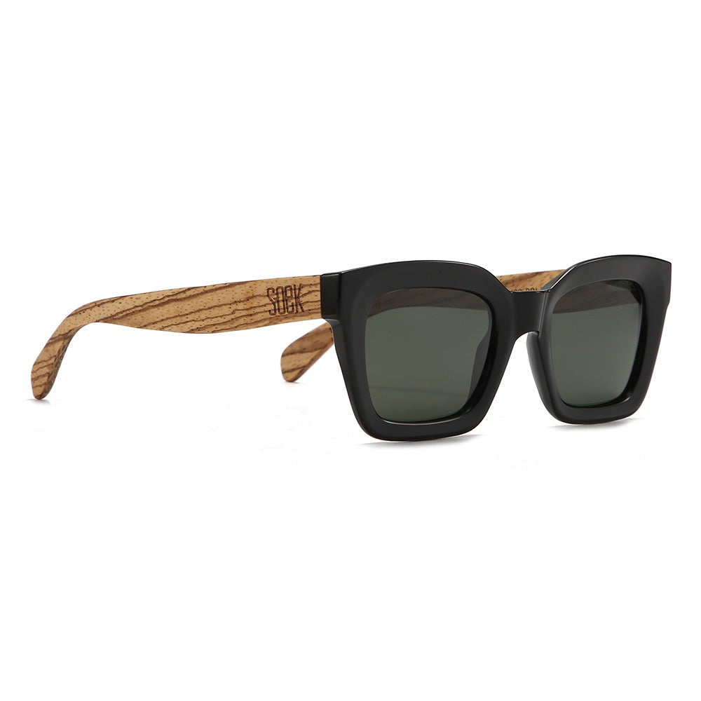 SOEK Zahra Midnight sunglasses with black square frames, walnut wood arms, and polarized lenses.