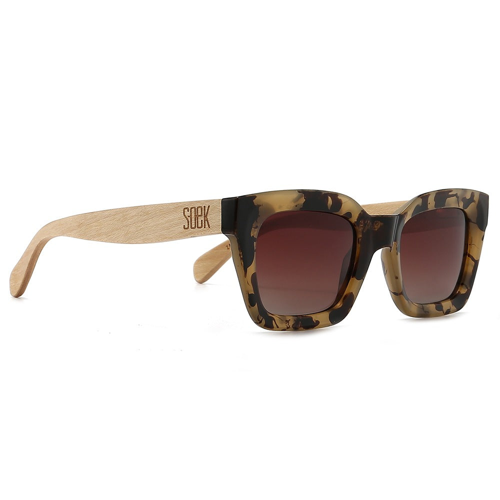 SOEK Zahra tortoise shell sunglasses with brown lenses, featuring white maple wood arms and black accents.