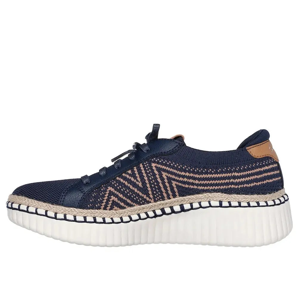 Skechers Wilshire Boulevard Bellevue Ladies navy textile vegan lace-up sneakers with lace-up closure, patterned design, and thick white sole.