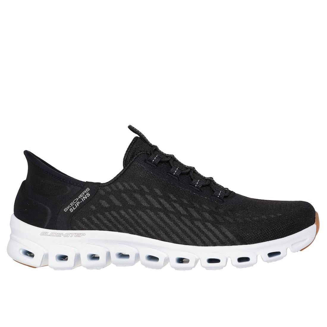 Skechers Glide Step Tranquility women's black and white textile slip-on trainers with cushioned sole and breathable design.