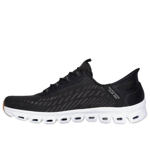 Skechers Glide Step Tranquility women's slip-on trainers in black and white with textured textile upper and cushioned outsole.