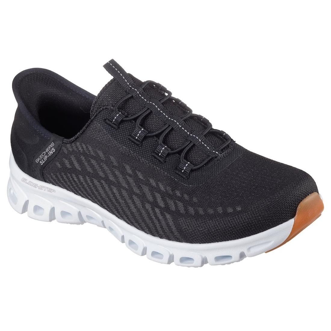 Skechers Glide Step Tranquility ladies slip-on trainers in black and white with cushioned white sole and textured textile upper.