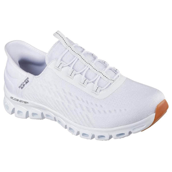 Skechers Glide Step Tranquility women's white and black slip-on trainers with cushioned sole and breathable textile upper.