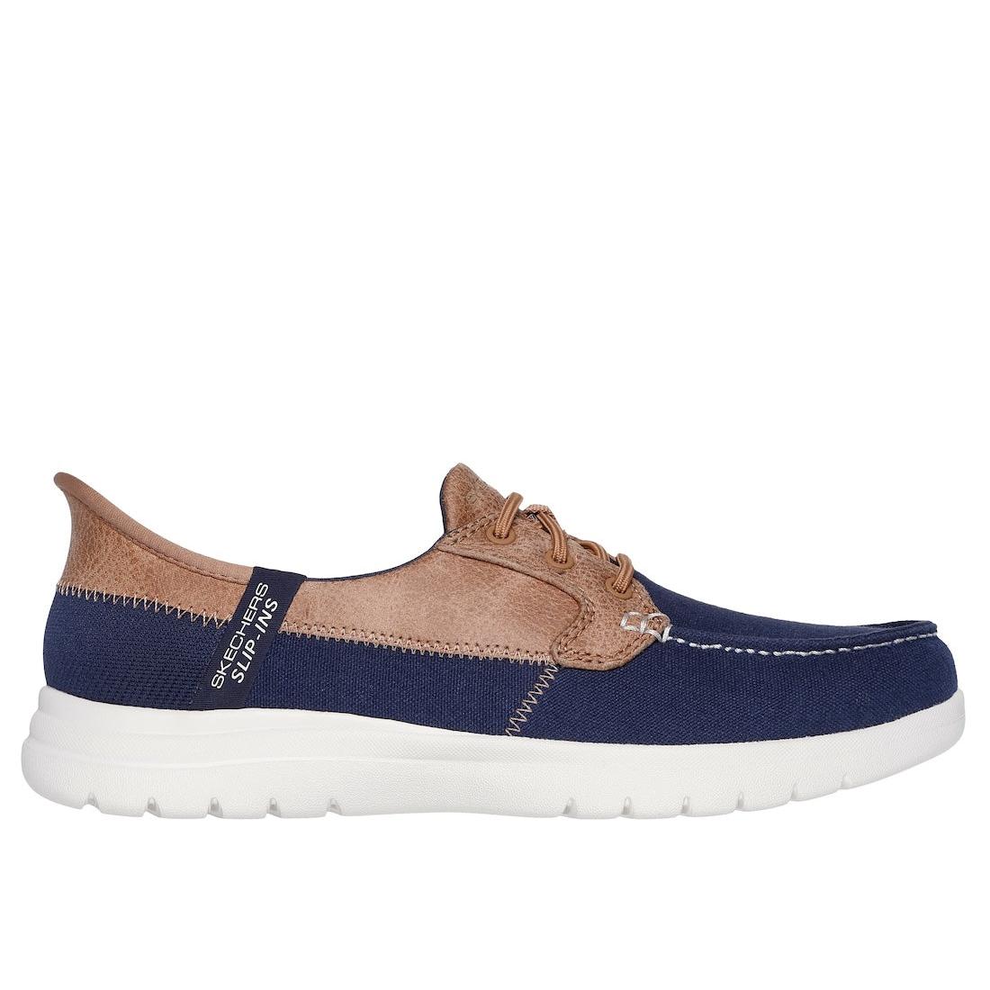 Skechers On-The-Go Flex Palmilla Ladies Navy Slip-On Shoes with mixed fabric upper and cushioned white sole.