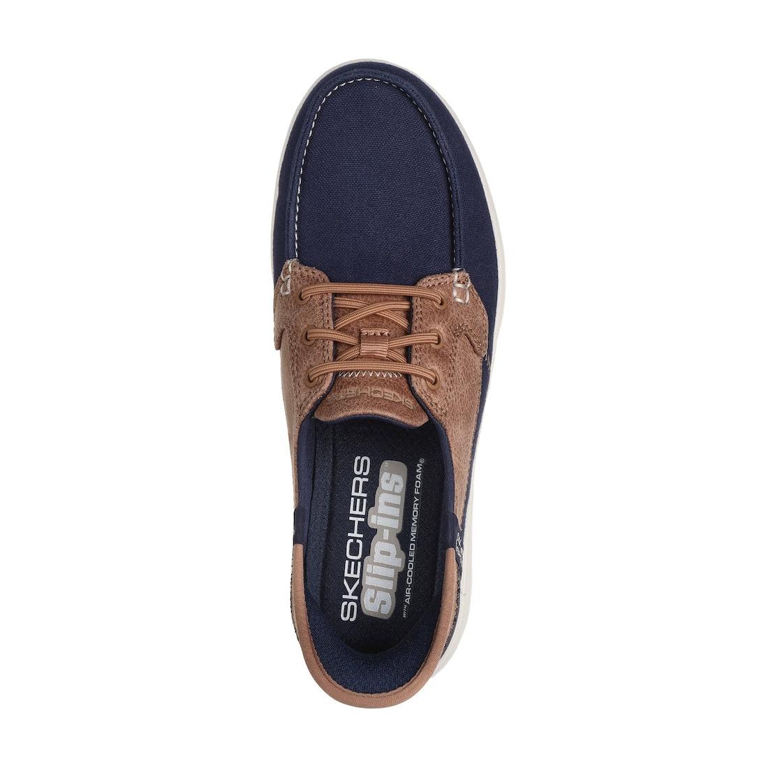 Skechers On-The-Go Flex Palmilla ladies slip-on shoes, navy and tan, with cushioned memory foam insole, lightweight and breathable.