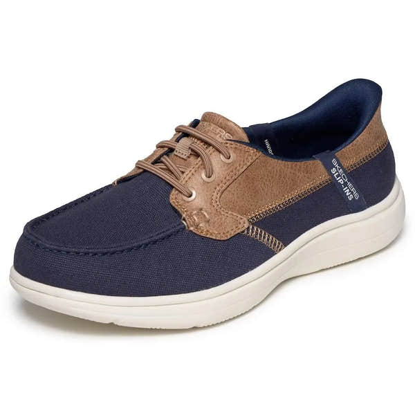 Skechers Ladies On-The-Go Flex Radiant Navy Vegan Slip-On Canvas Boat Shoe with brown accents and white sole.