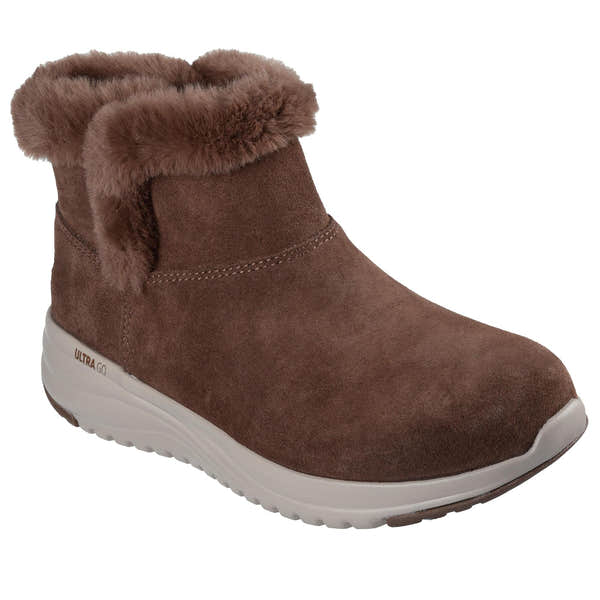 Skechers women's Cozy Step ankle boots in chocolate suede with faux fur lining and white Ultra Go sole for comfort.